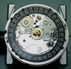 Rolex vs. Omega: Date Mechanism & Escapement - The Watch Doctor